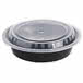 Choice 24 oz. Black 7 1/4 inch Round Microwavable Heavyweight Container with Lid - 150